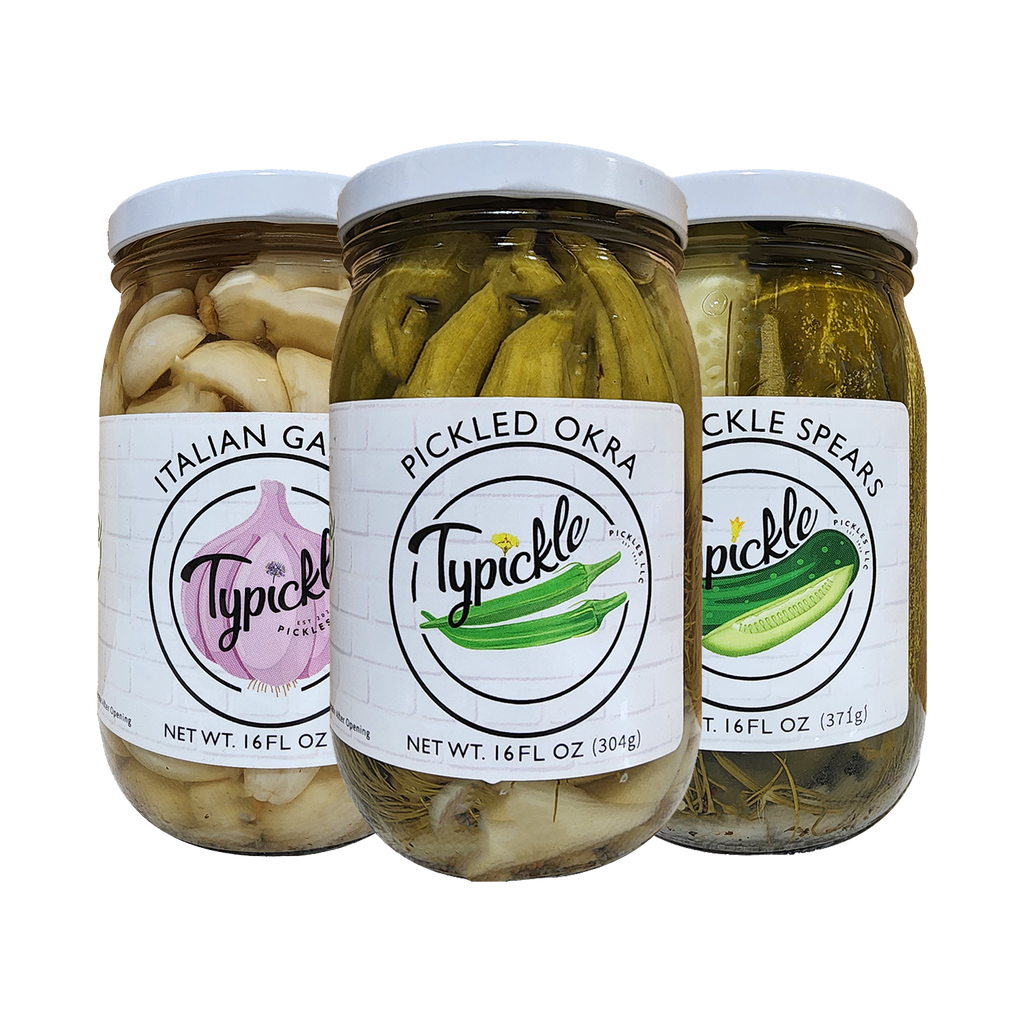 three jars of pickles and pickles with labels on them